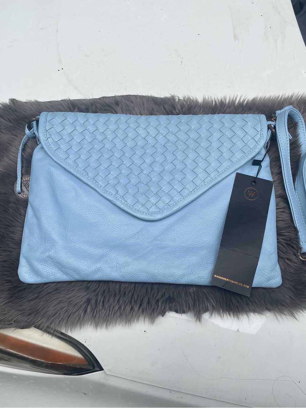 NWT Wanderers Travel Co Marseille Woven Crossbody clutch In Sky Blue